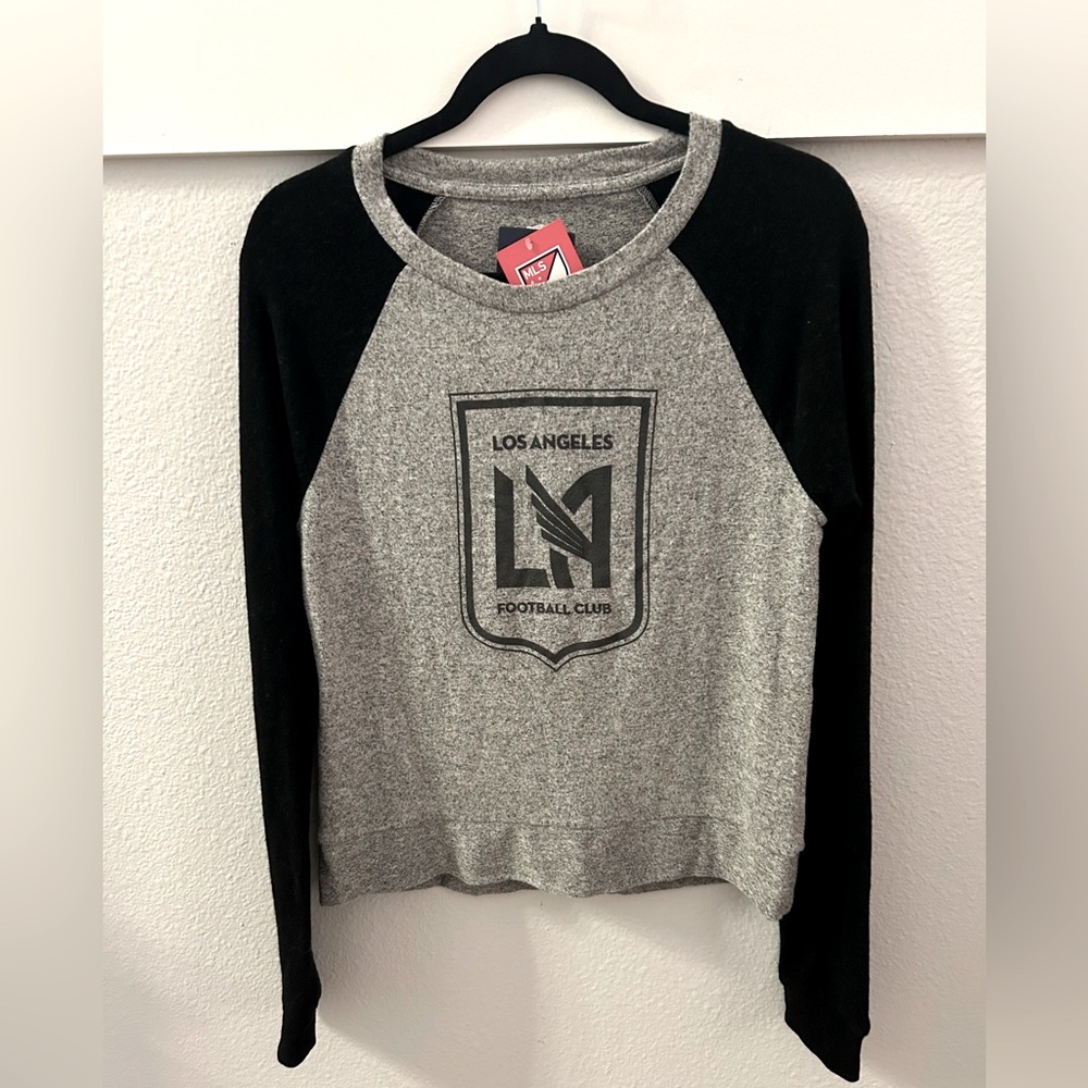 Black and gray, baseball style, long sleeve LAFC women’s shirt.